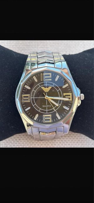 Reloj plateado de hombre