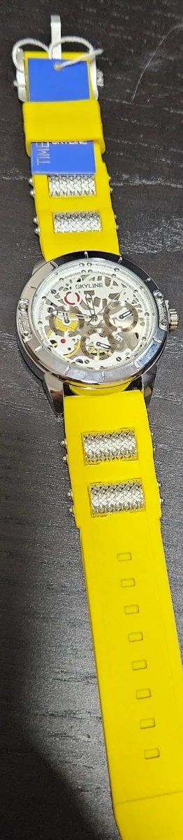 Reloj Skyline Esqueleto Plata y Amarillo