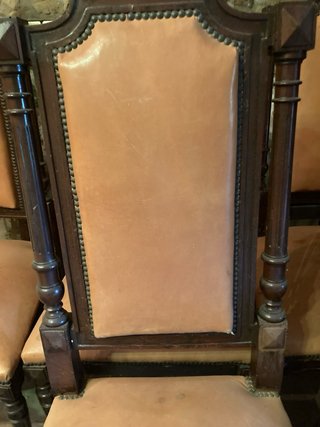 Conjunto de 7 sillas y 2 sillones de madera y piel