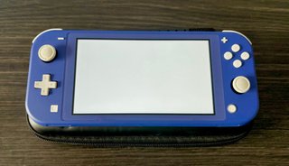 Nintendo Switch Lite + custodia + cover Animal Crossing