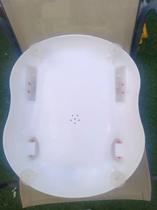Asiento de baño para bebé con juguetes
