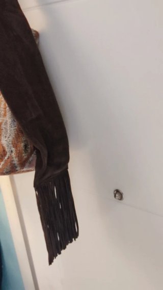 Bolso de tela con flecos