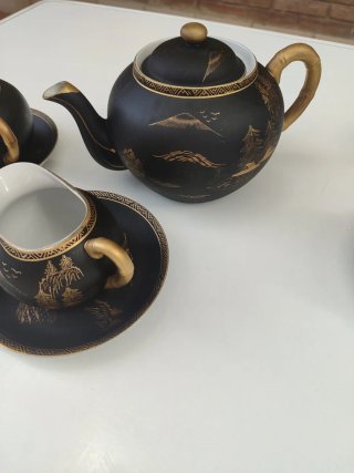 Juego de té porcelana negro y dorado,