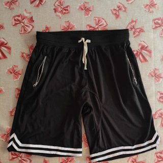 Pantaloncini neri con zip e laccetti