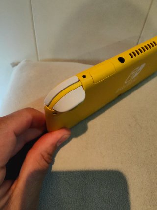 Nintendo Switch Lite + Cargador Original