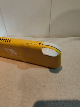 Nintendo Switch Lite + Cargador Original