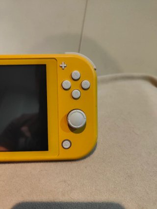 Nintendo Switch Lite + Cargador Original