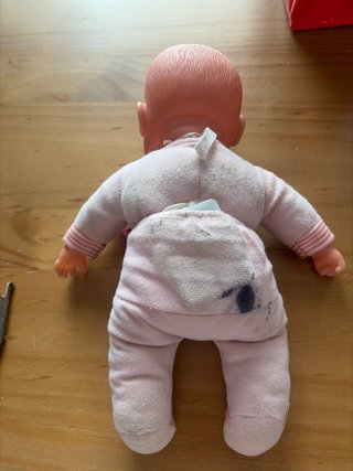 Muñeca bebé con chupete