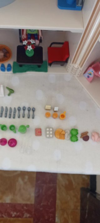 Casa Playmobil con figuras y accesorios