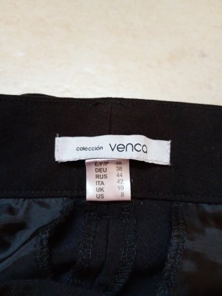 Pantalón negro con cinturón