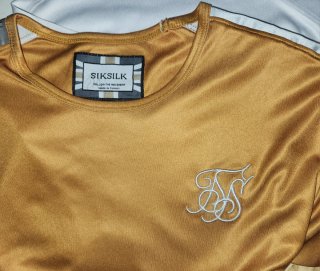 Camiseta SIKSIKIL Oro y Blanco Talla XS