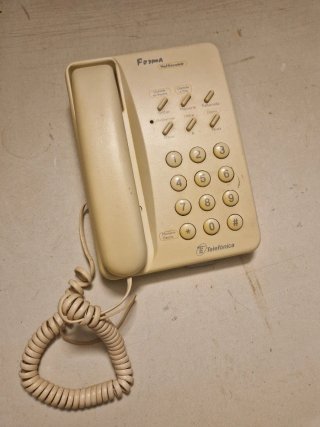 Teléfono fijo Forma beige antiguo
