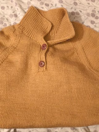Jersey de punto color camel con cuello alto y boto