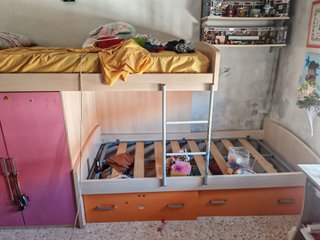 Cama nido con armario y cajones