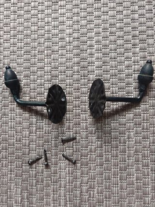 Soportes y terminales de forja para cortinas
