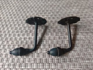 Soportes y terminales de forja para cortinas