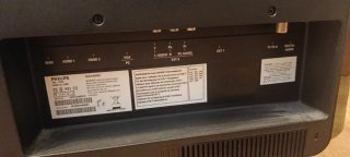 Televisor Philips Negro y samsonite negro