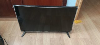 Televisor Philips Negro y samsonite negro