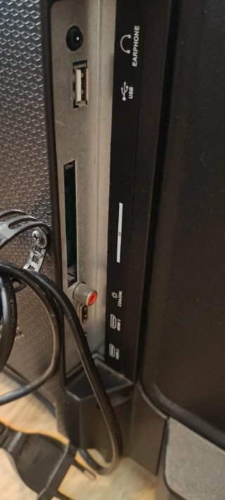 Televisor Philips Negro y samsonite negro