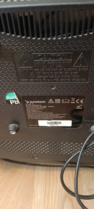 Televisor Philips Negro y samsonite negro