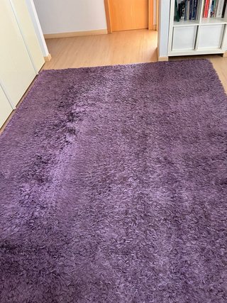 Alfombra mullida morada