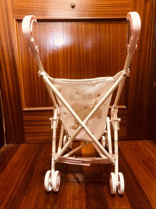 Silla de paseo para muñecas rosa
