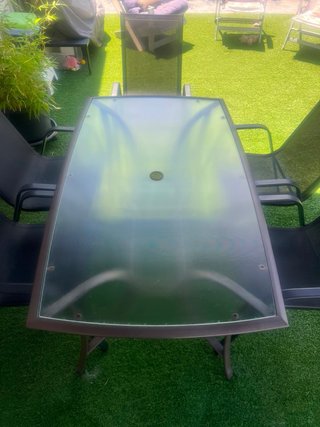 Mesa y 6 sillas de jardín cristal y metal