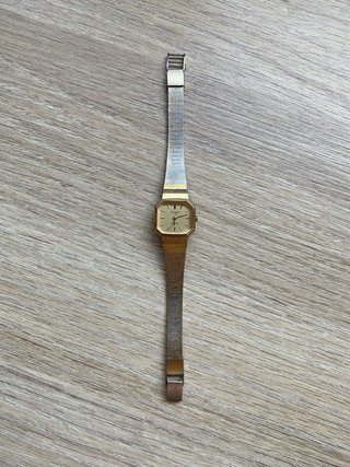 Reloj Orient Quartz Dorado y Plateado