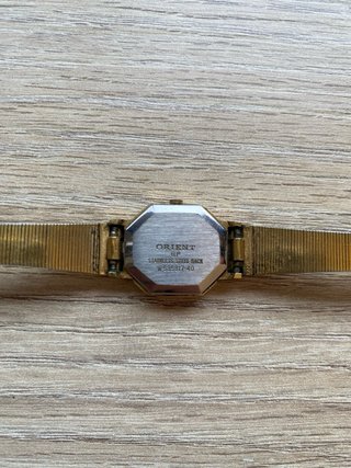 Reloj Orient Quartz Dorado y Plateado