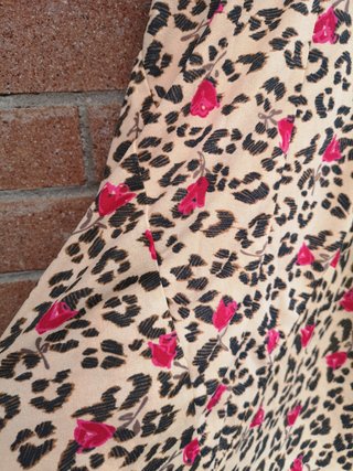 Abito vintage stampa animalier con rose