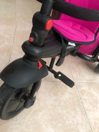 Triciclo rosa y negro