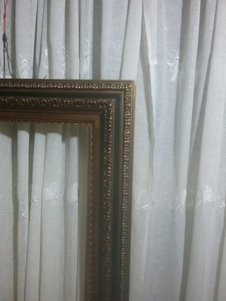 Marco antiguo de madera dorado