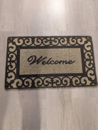 Tappeto d'ingresso beige e marrone