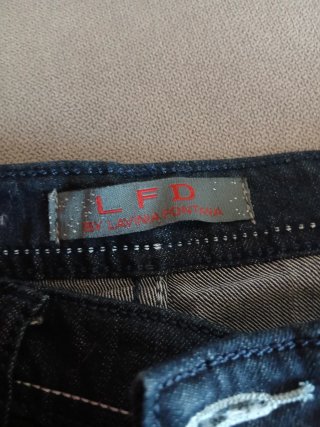 Jeans neri con borchie