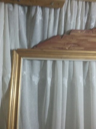 Marco antiguo madera con peineta.