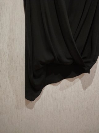 Camisa negra sin mangas
