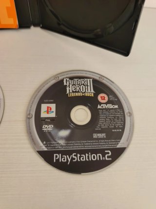 PS2 Gran Turismo 4 y Guitar Hero