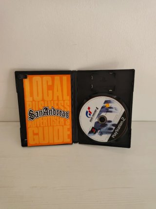 PS2 Gran Turismo 4 y Guitar Hero