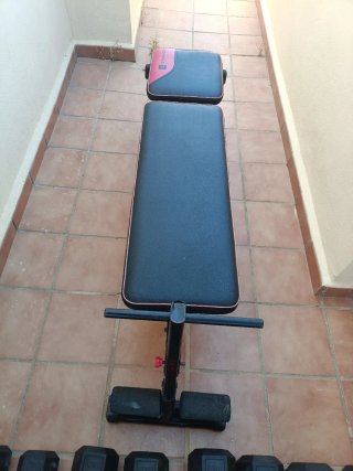 Banco de pesas y juego de mancuernas