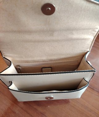 Bolso de mano con estampado de serpiente
