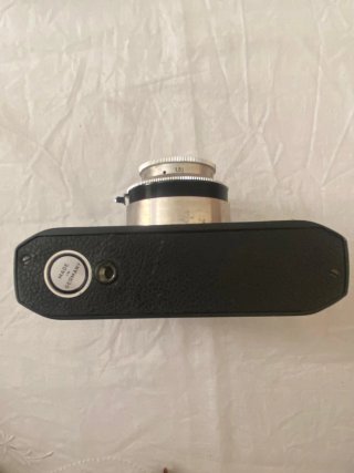 Cámara Iloca con funda de cuero