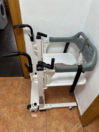 Silla de transferencia con elevador como nueva
