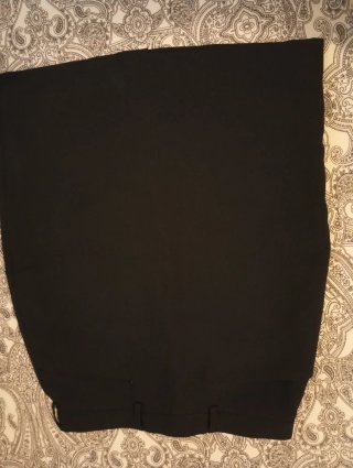 Falda y chaleco de camarera negro