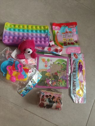 Lote juguetes niña: peluche, puzzle, pop it