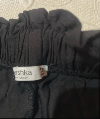 Pantalones cortos negros con cinturón