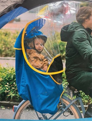 Protector lluvia asiento bici infantil