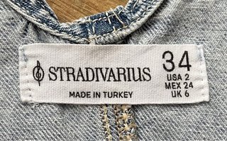 Peto vaquero roto claro Stradivarius Talla XS
