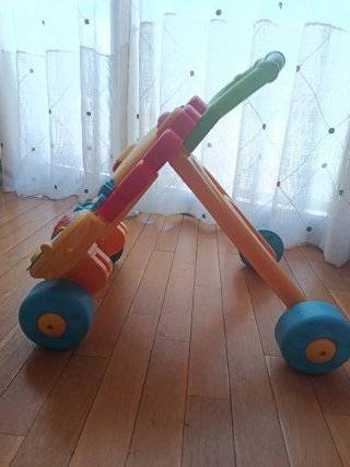 Andador musical León Fisher Price