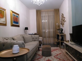 Sofá capitoné lino beige y gris
