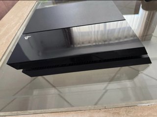 PS4 Negra con Juegos y Accesorios